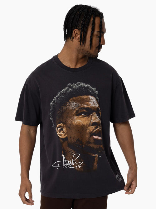 Giannis Antetokounmpo Big Head Tee in vintage black featuring oversized player portrait for the ultimate fan.