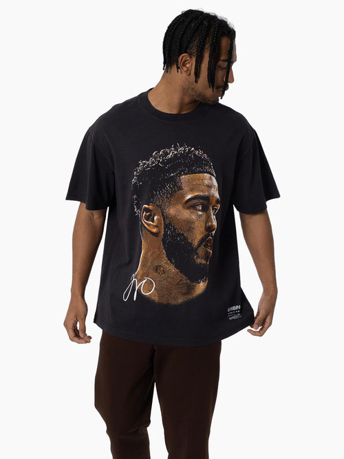 Detail of Jayson Tatum Big Head Tee in vintage black featuring oversized player portrait.